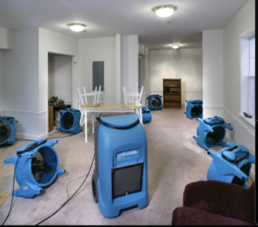 Air movers and dehumidifier setup for Water Damage Restoration in Woodbury